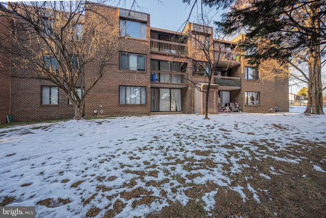 view of snow covered building