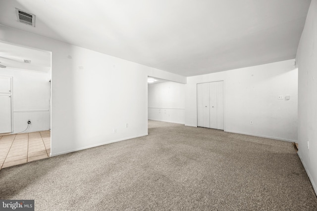 empty room featuring carpet floors