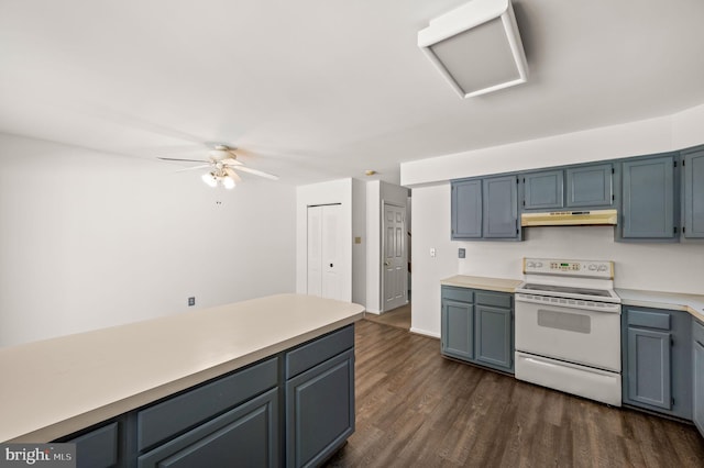 kitchen with dark wood-type flooring, white electric range oven, and ceiling fan