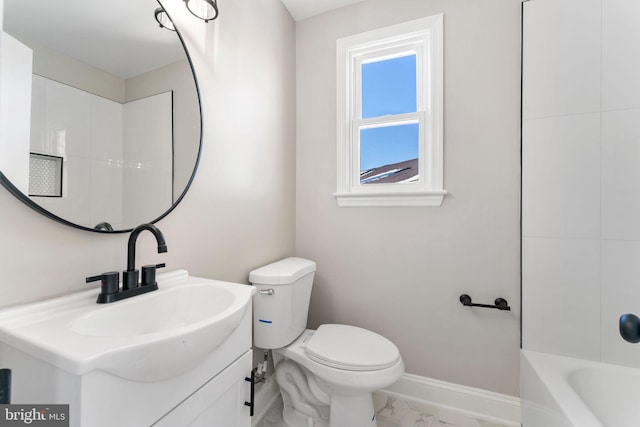 bathroom with toilet and vanity