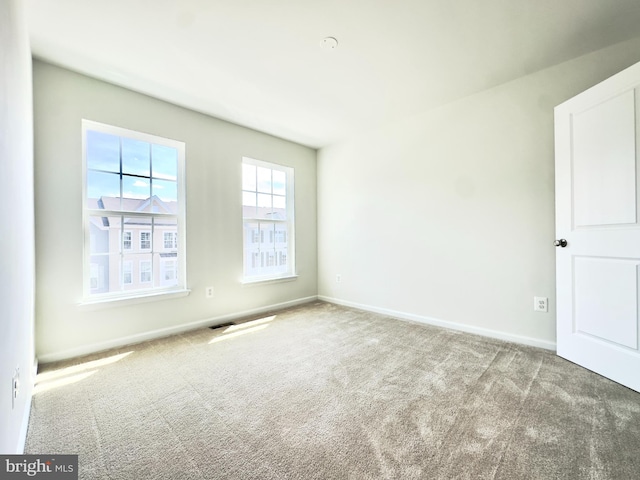 view of carpeted spare room