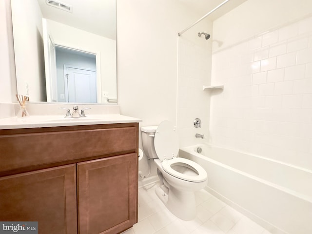 full bathroom with shower / bathing tub combination, tile patterned flooring, vanity, and toilet