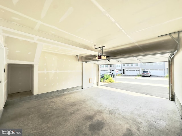 garage featuring a garage door opener