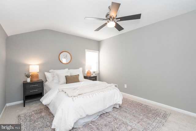 bedroom with lofted ceiling, carpet floors, and ceiling fan