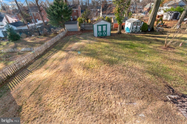 view of yard with a storage unit