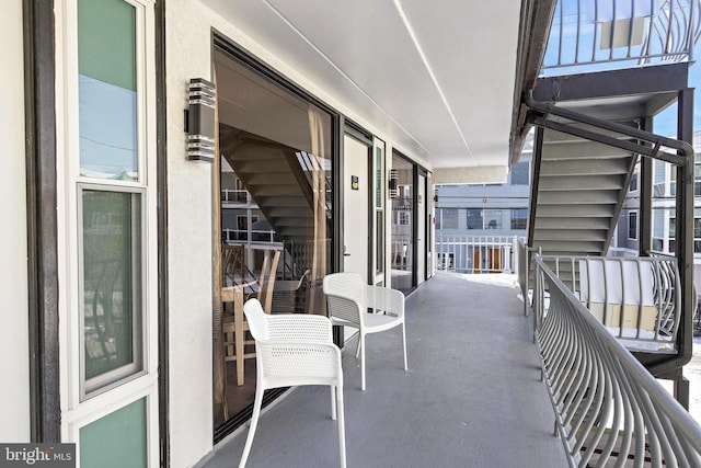 view of patio / terrace with a balcony