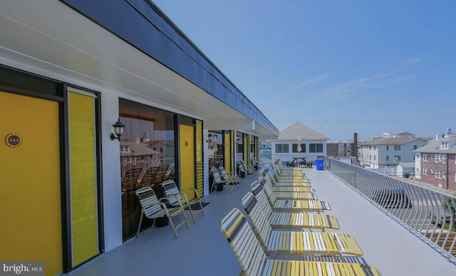 view of patio with a balcony