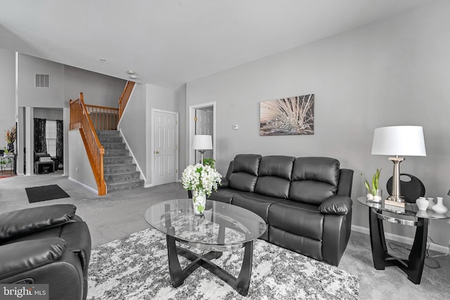 living room featuring light carpet