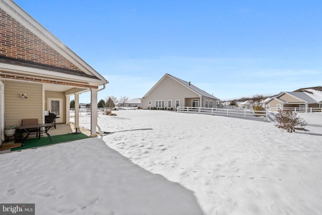 view of snowy yard