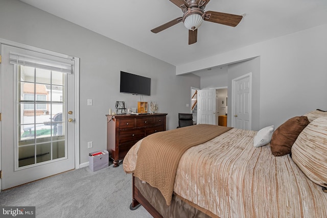 bedroom featuring ceiling fan and light colored carpet