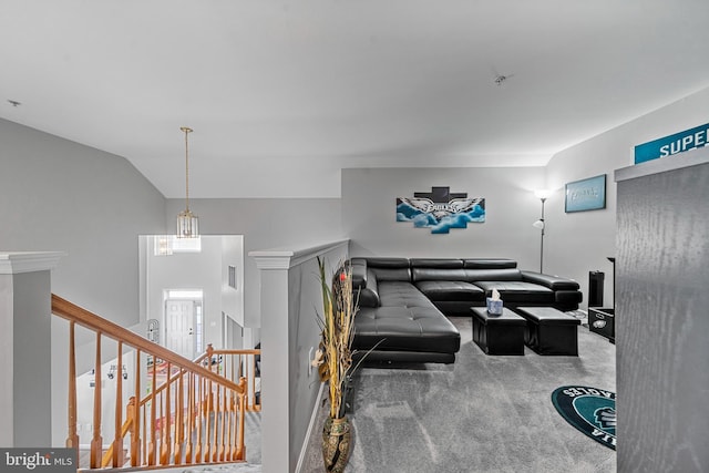 living room with vaulted ceiling and carpet