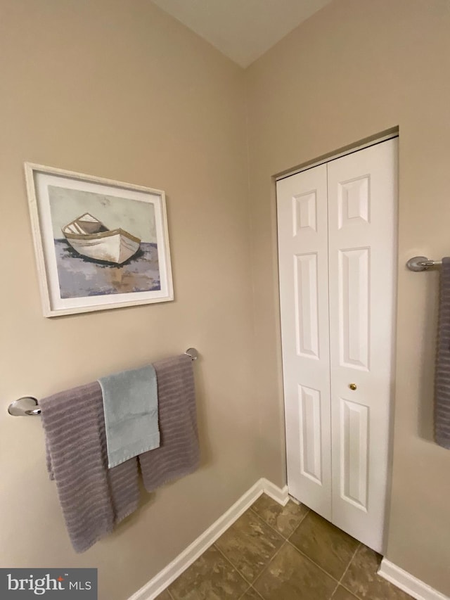 bathroom with tile patterned floors