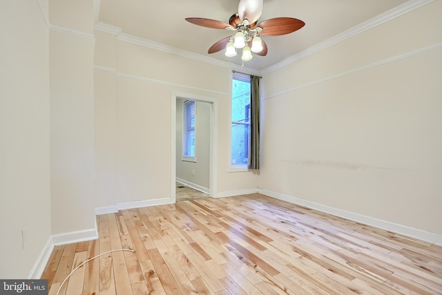 unfurnished room with ornamental molding, ceiling fan, and light hardwood / wood-style floors