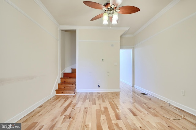 interior space with light wood-type flooring, ceiling fan, and crown molding