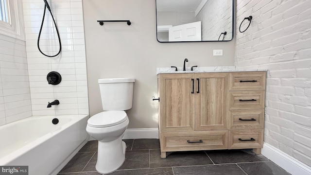 full bathroom with toilet, tile patterned flooring, washtub / shower combination, and vanity