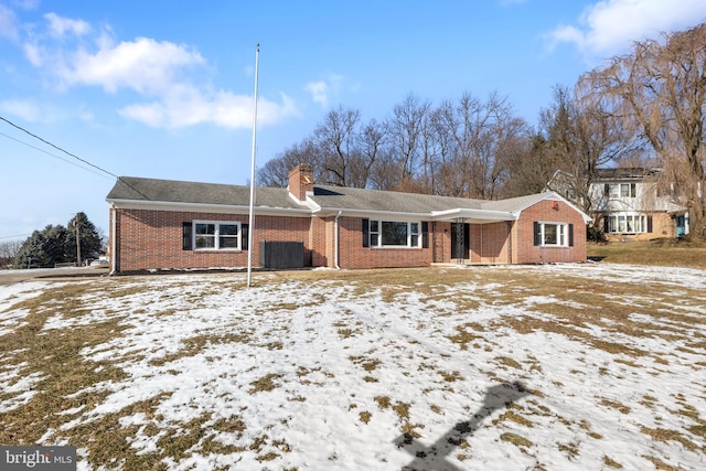 view of front of home featuring central AC unit