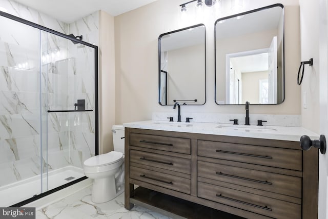 bathroom with toilet, a shower with door, and vanity