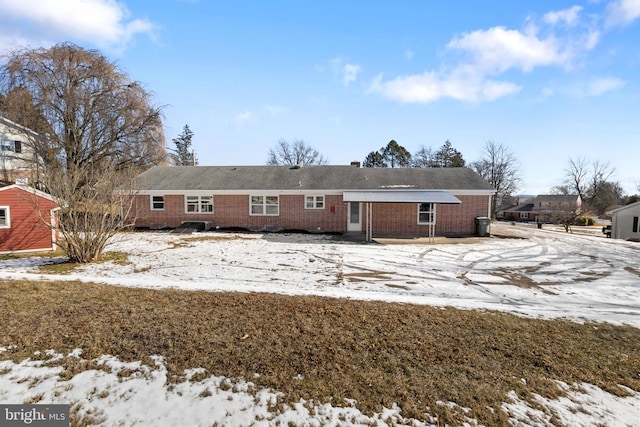 view of snow covered property