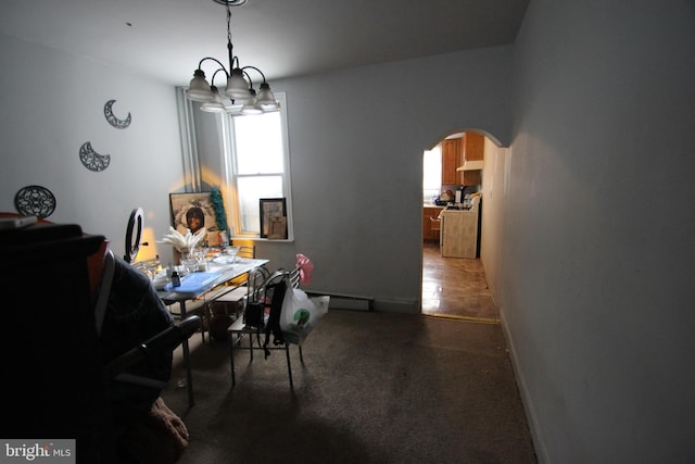 dining room featuring a chandelier