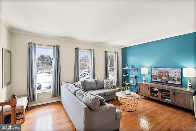 living room with light hardwood / wood-style flooring