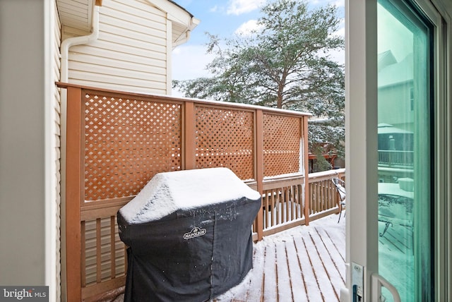 view of snow covered deck