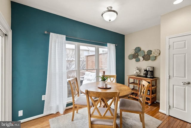 dining room featuring hardwood / wood-style flooring