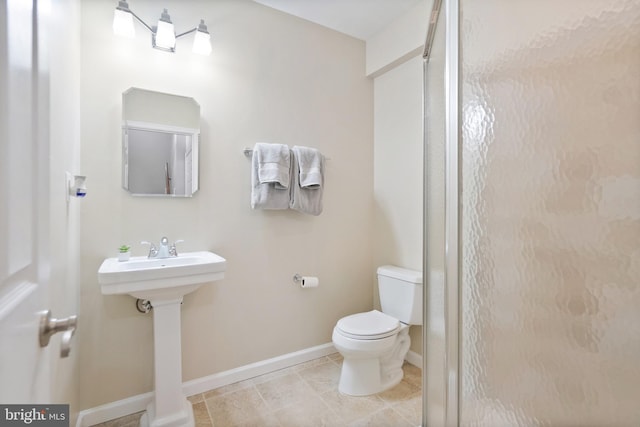 bathroom featuring sink and toilet