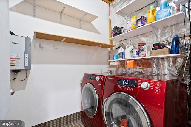 laundry room featuring washing machine and clothes dryer