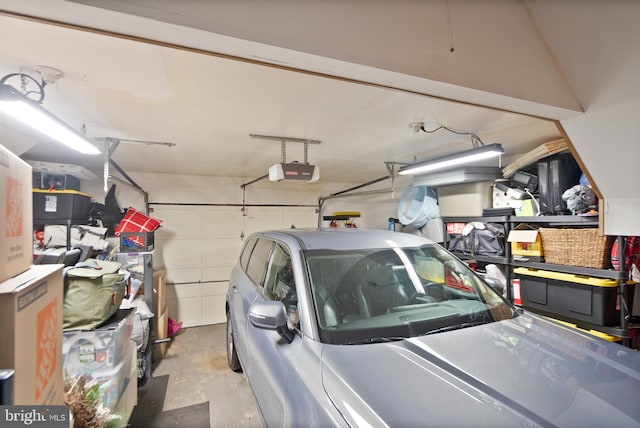 garage featuring a garage door opener