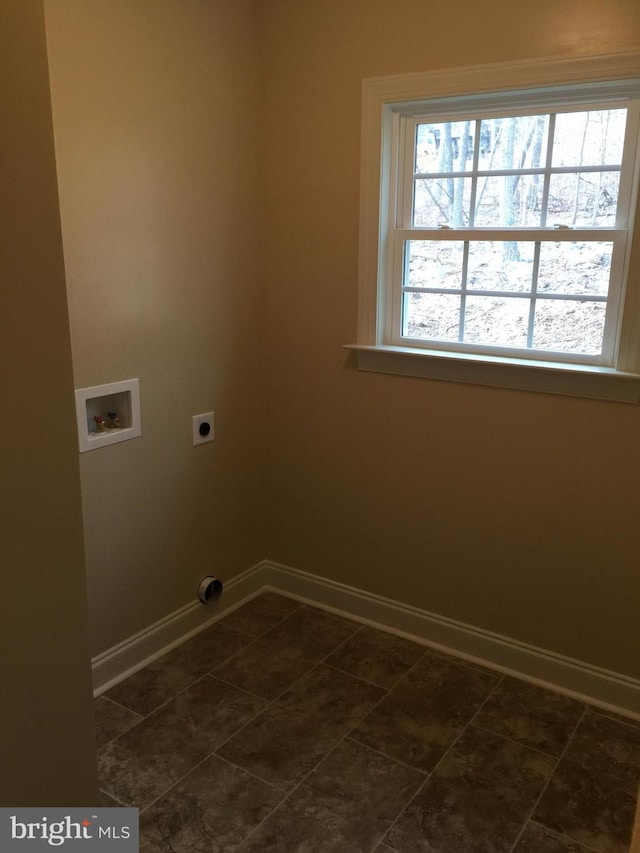 laundry room with hookup for a washing machine and hookup for an electric dryer