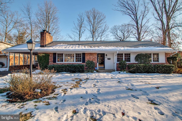 ranch-style home with a carport