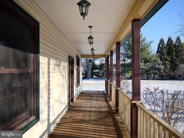 view of snow covered deck