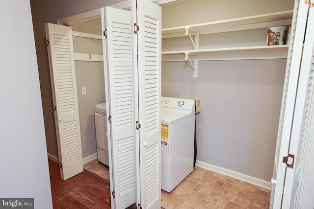 washroom featuring washer / dryer