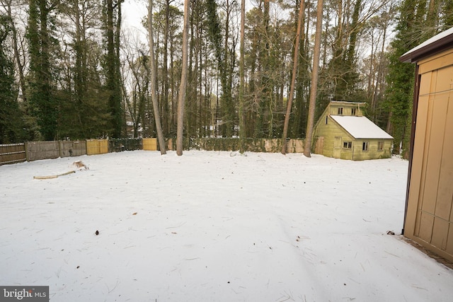 view of yard covered in snow