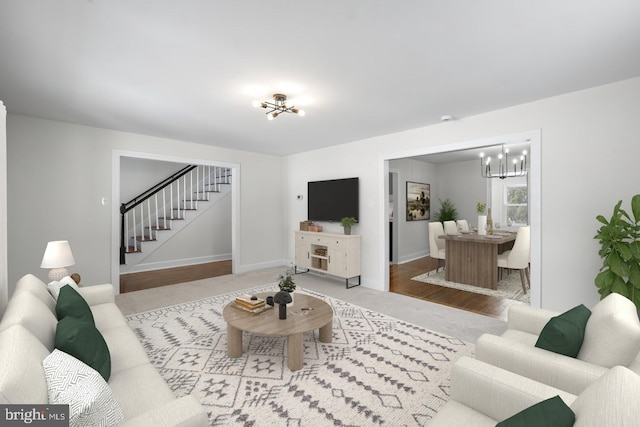 living room featuring carpet floors and a chandelier