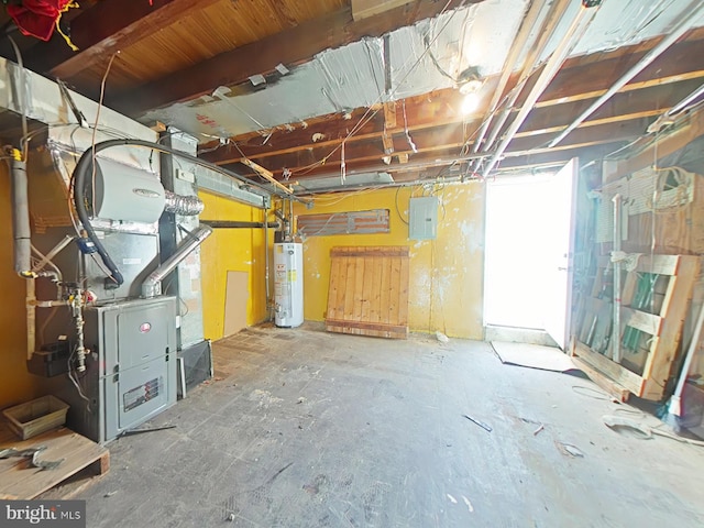 basement with heating unit, electric panel, and water heater