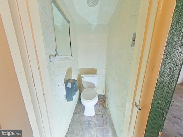 bathroom featuring toilet