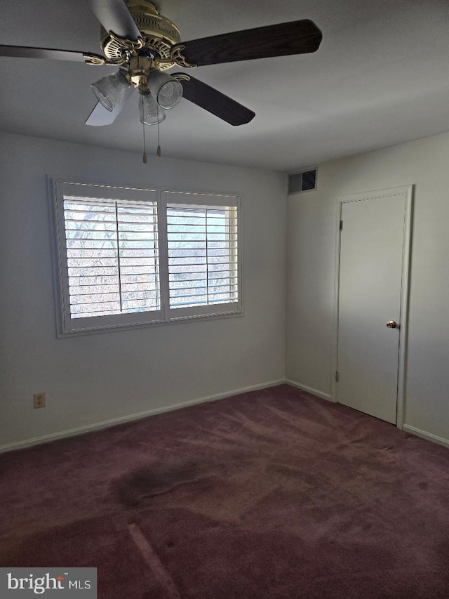 spare room with carpet flooring