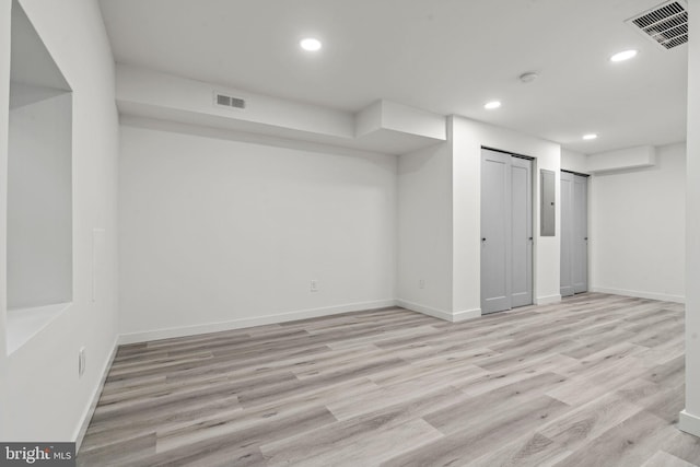 basement with light wood-type flooring