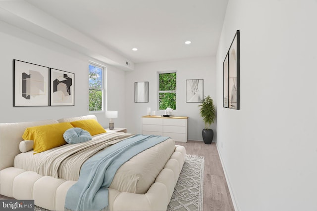 bedroom with light hardwood / wood-style flooring