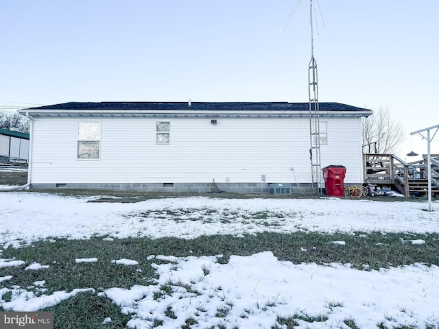 view of snow covered property