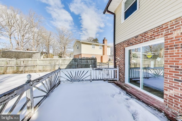 view of snow covered patio