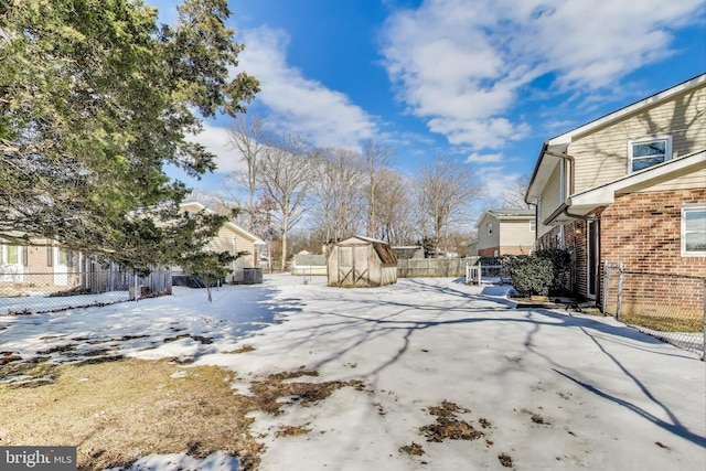 view of yard covered in snow