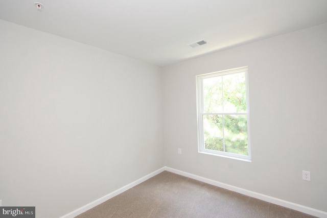 view of carpeted spare room