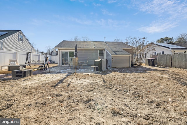 back of property featuring a patio area