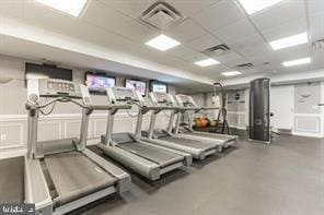 gym with a drop ceiling