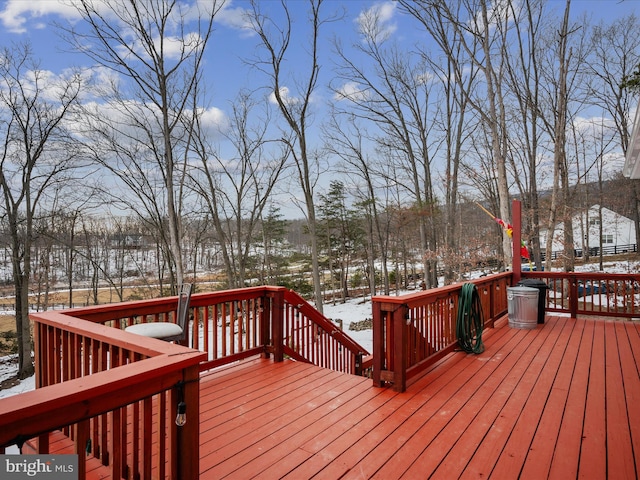 view of snow covered deck