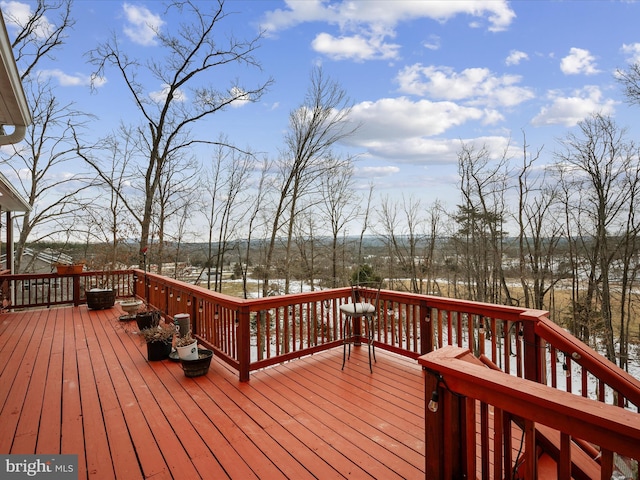 view of snow covered deck