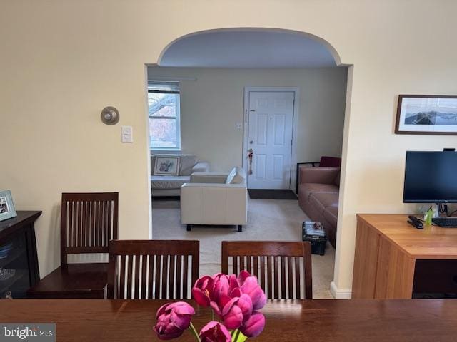 view of carpeted dining area