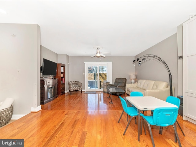 interior space with ceiling fan and light wood-type flooring